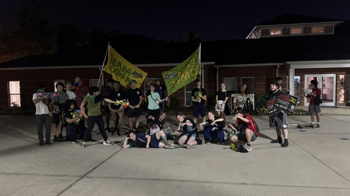 A large group of HVZ players gathered outside at night