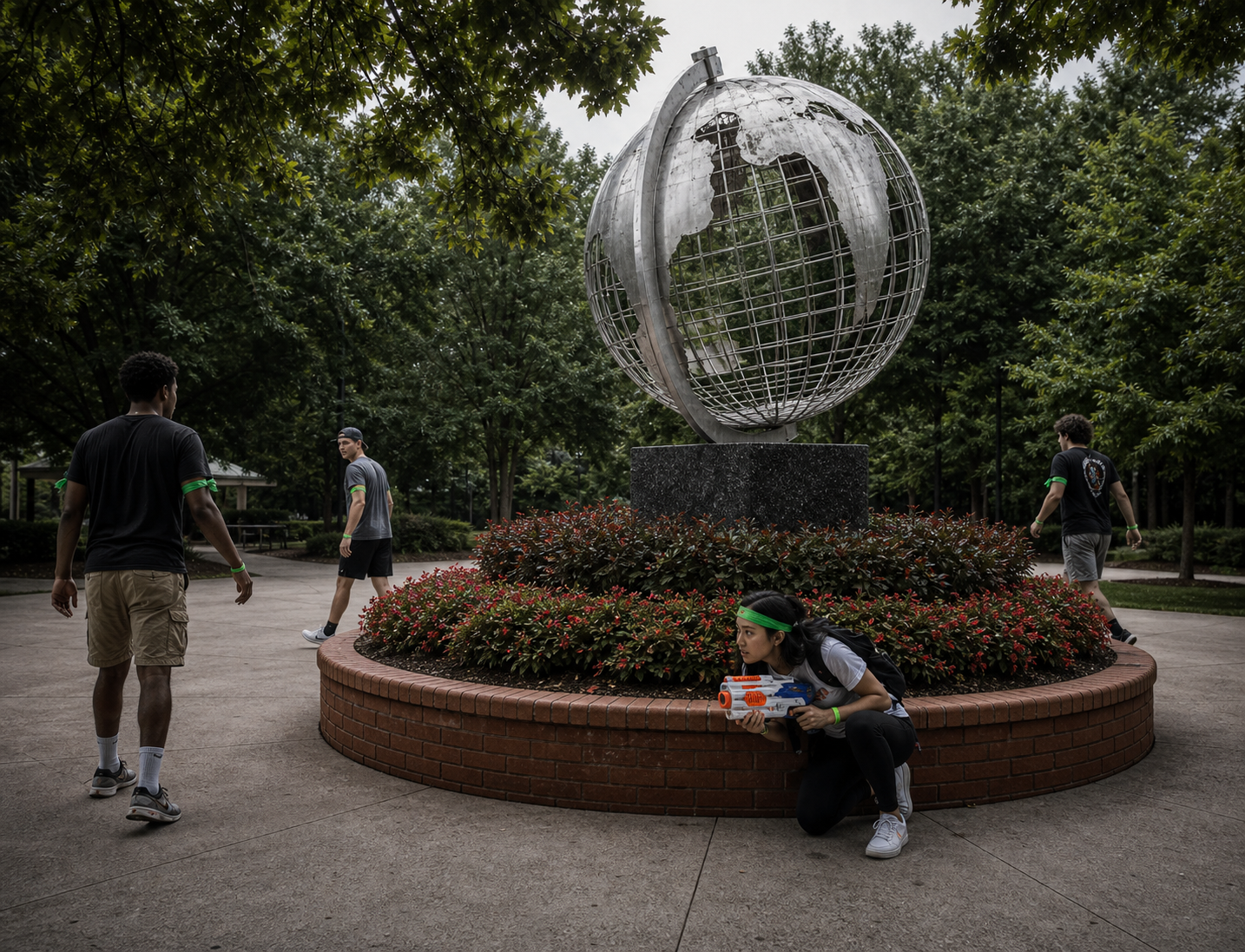 A human player hiding near the KSU Marietta globe while zombies search nearby