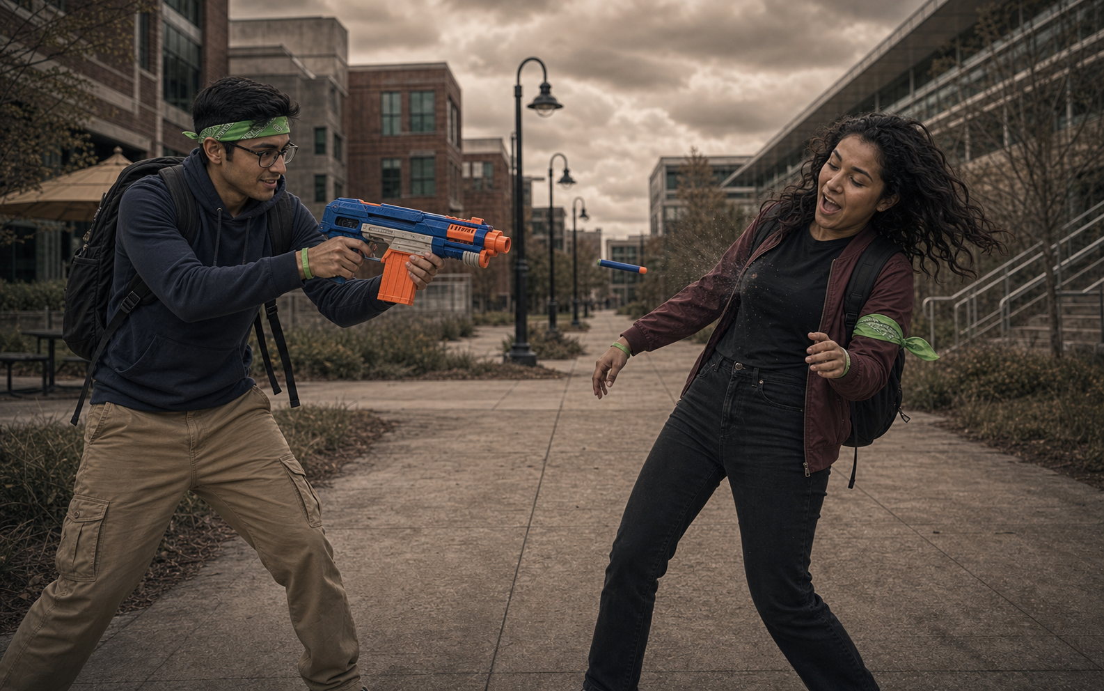 Human player using a foam blaster to land a valid body hit on a zombie player